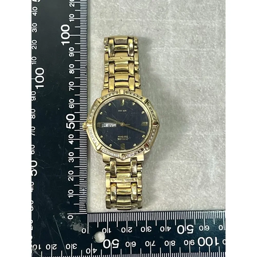 Citizen Eco-Drive Diamond Bezel Gold Tone Day Date Spanish WR100 Watch Works